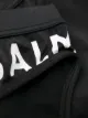 Balmain black swimming trunks with logo print at the side