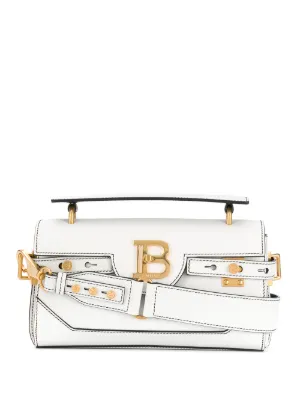 B-Buzz 18 baguette bag by Balmain, available on farfetch.com for $2491 Lucy Hale Bags SIMILAR PRODUCT