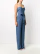 Materiel belted strapless jumpsuit
