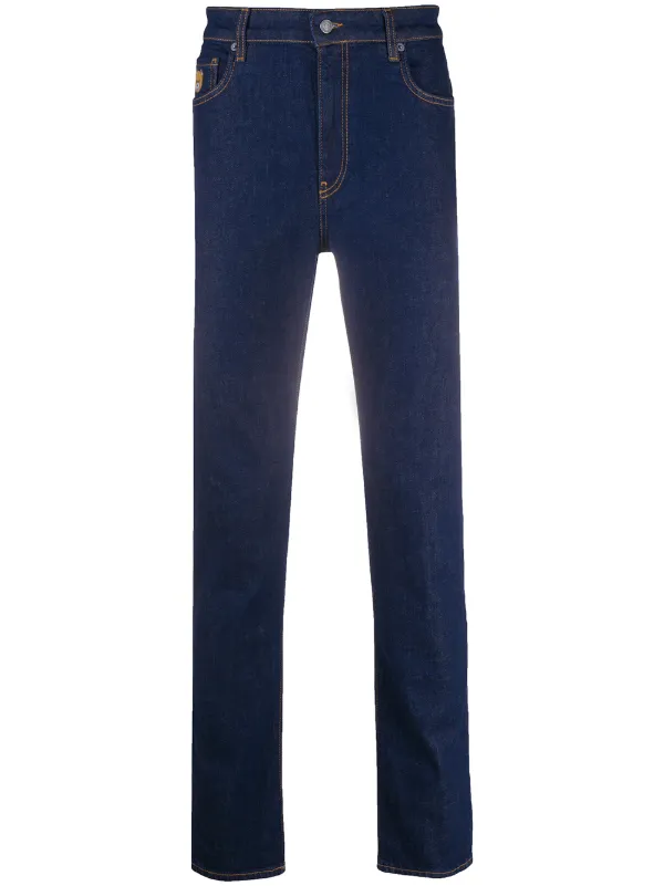 Shop Moschino Teddy Bear patch jeans 