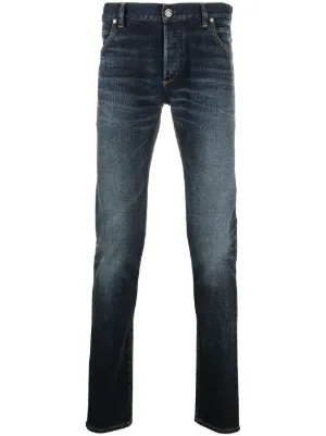 designer jeans with crosses on them