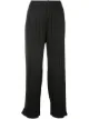 الصورة 1 من Pleats Please Issey Miyake بنطال بقصة واسعة وكسرات