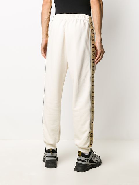 gucci pants with stripe down the side