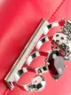 Alexander McQueen Four Ring handle clutch