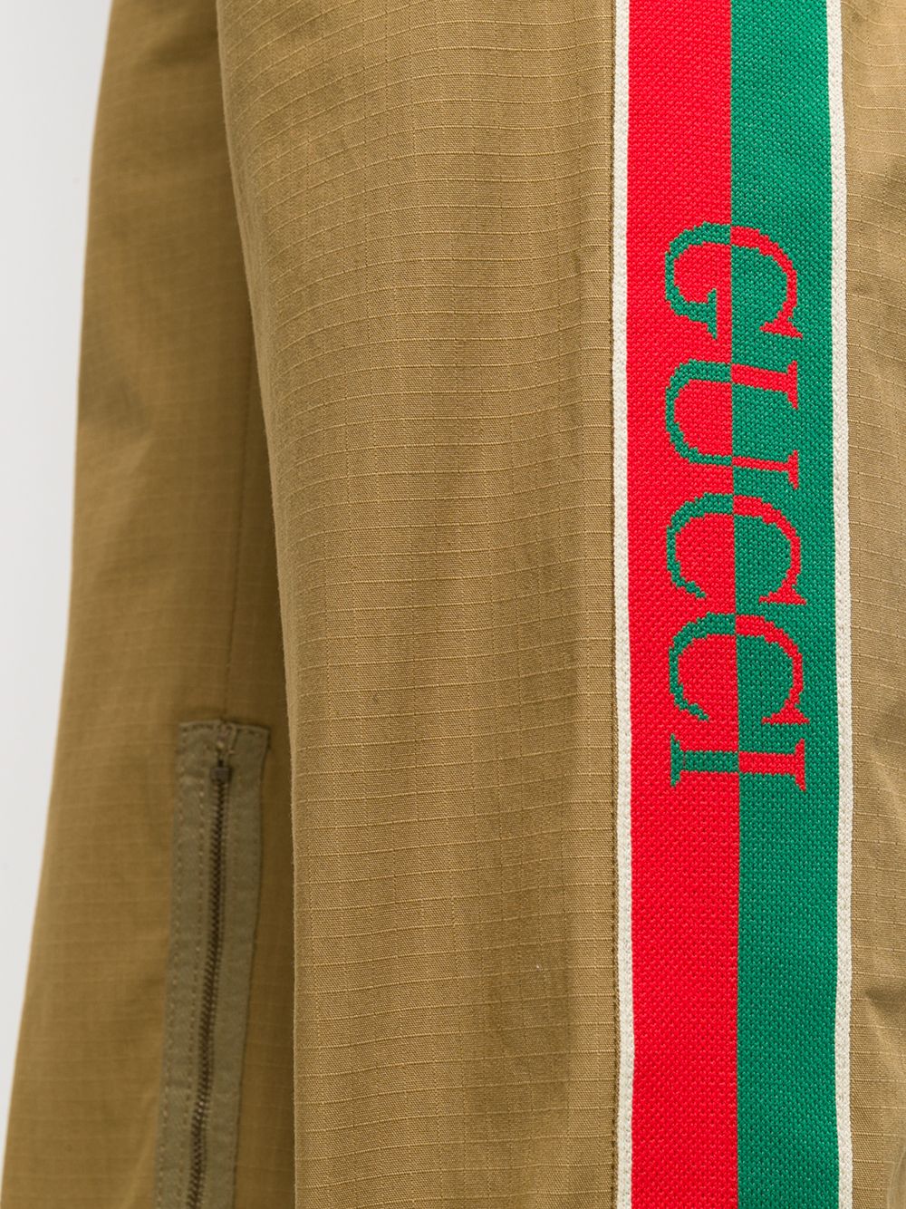 фото Gucci брюки с логотипом на лампасах