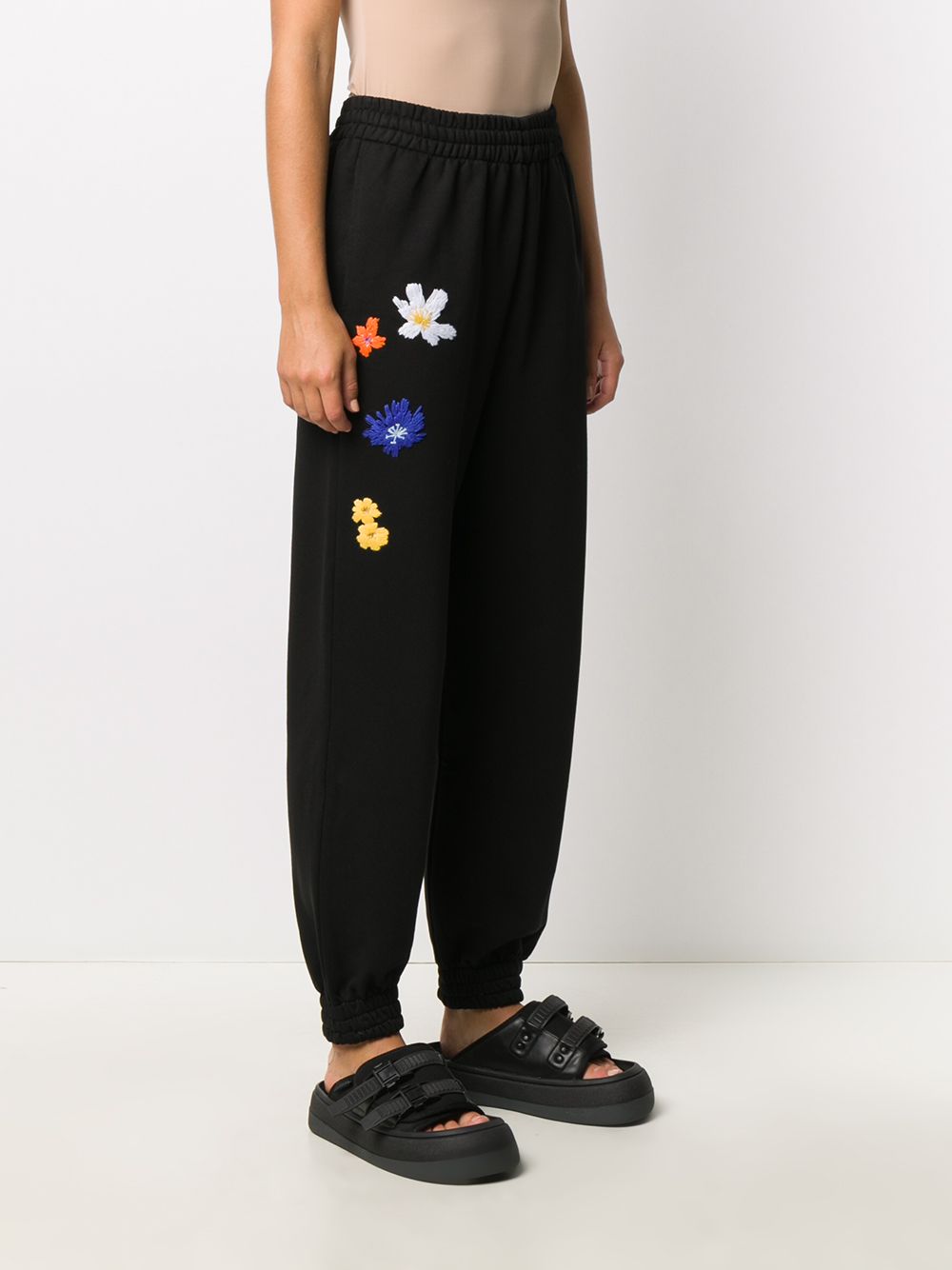 фото Mcq swallow floral embroidered track pants