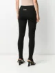 Lourdes stirrup-hem fitted trousers