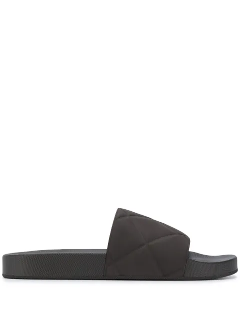 Click to view more detailed imagery on our partner's website Bottega Veneta Intrecciato Embossed Slide Sandal In 1000 Black