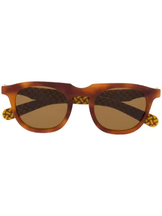 Farfetch Accessori Occhiali da sole Occhiali da sole tondi effetto tartarugato Marrone 