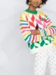 Mira Mikati سويتر بنقش شيفرون مطرز