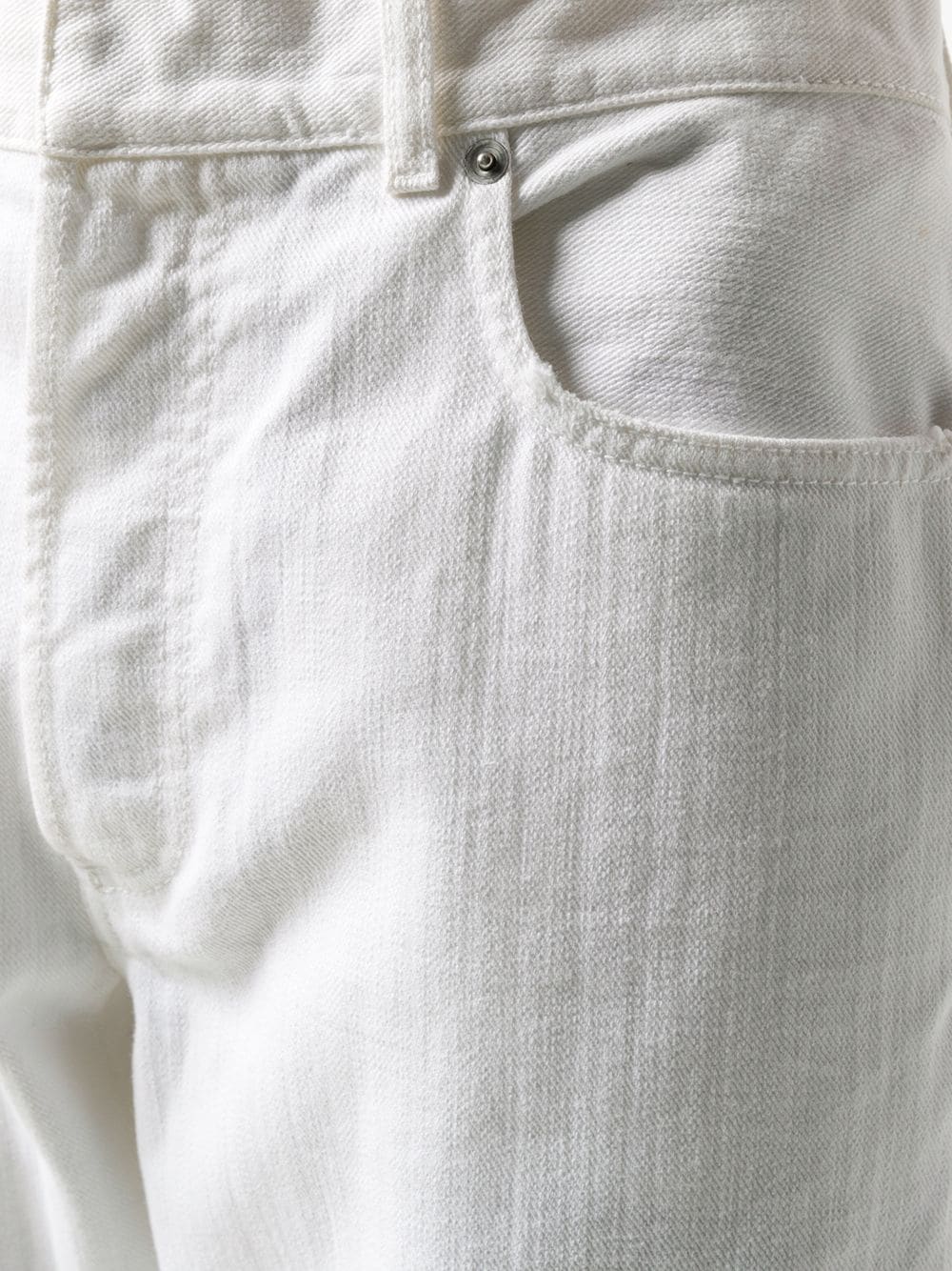 фото Christian dior укороченные джинсы с бахромой