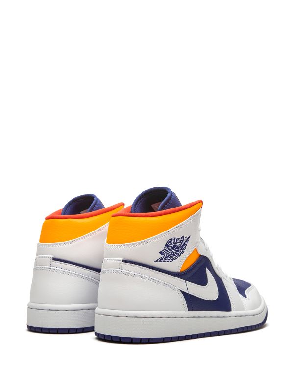 blue and white jordans with orange laces
