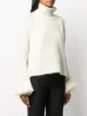 JW Anderson كنزة بجوانب مفتوحة وأكمام واسعة