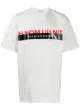 Image 1 of Ih Nom Uh Nit logo-print cotton T-shirt