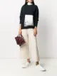 الصورة 2 من Jil Sander كنزة برقبة مستديرة وزينة شارة