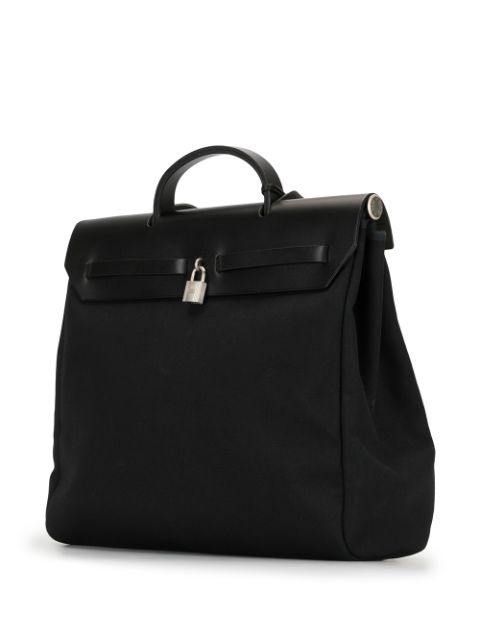 Shop black Hermès 2000s pre-owned Her Bag MM 2 in 1 2way bag with Afterpay - Farfetch Australia