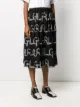 Comme Des Garçons Girl تنورة ميدي بأبليكة