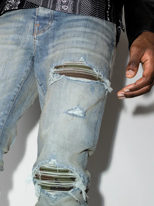 AMIRI ripped distressed skinny jeans 