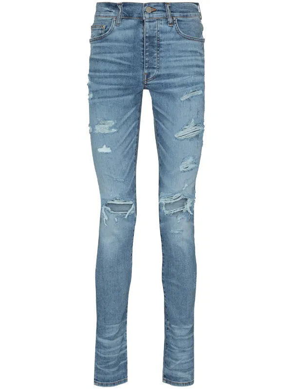 AMIRI Thrasher distressed skinny jeans 