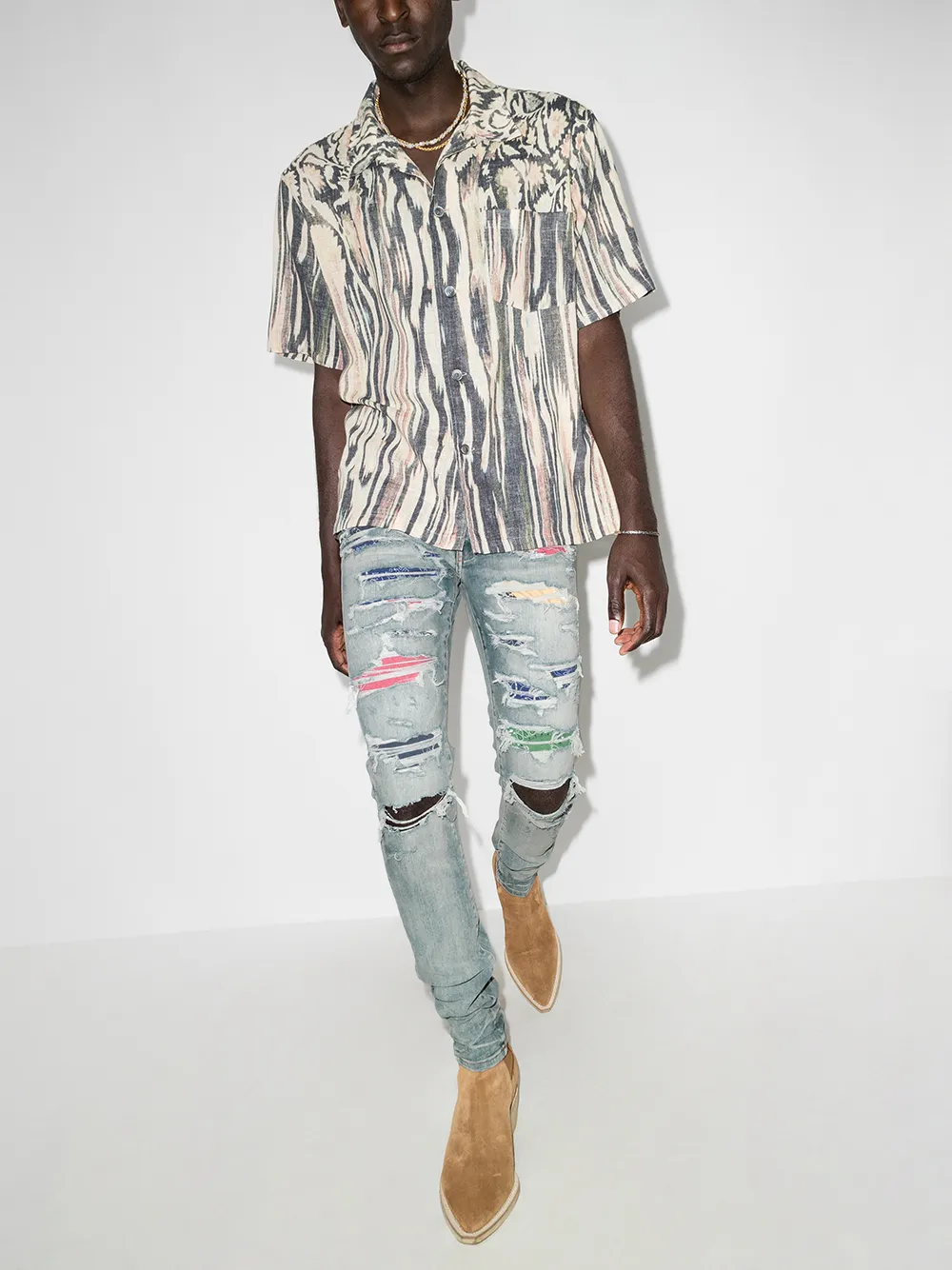 фото Amiri джинсы скинни с нашивками