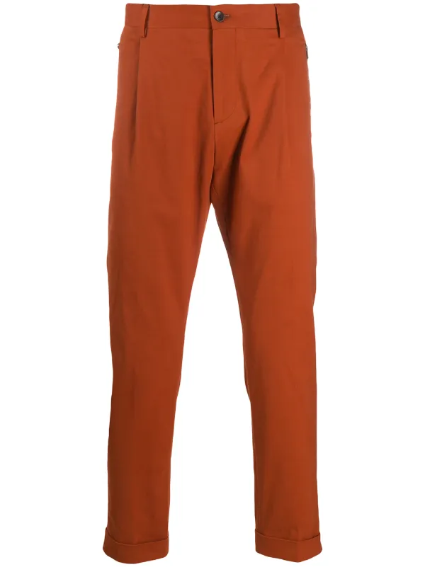 orange tapered trousers