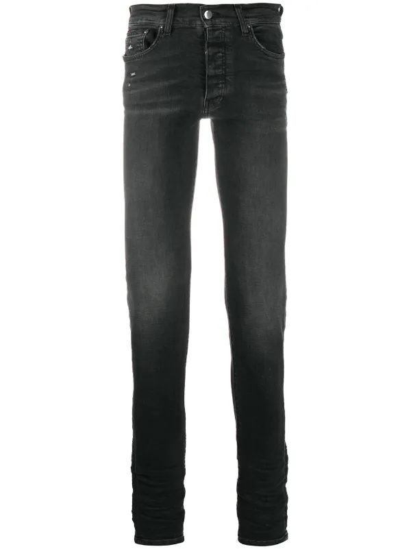 amiri distressed skinny jeans