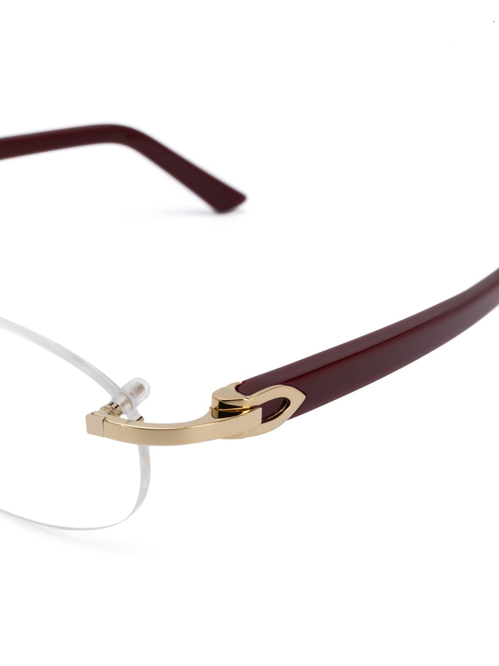 Shop Cartier Rimless Oval Optical Glasses In Red