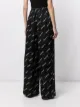 Balenciaga camouflage logo-print trousers