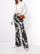 Image 2 of Adam Lippes floral-print flared trousers