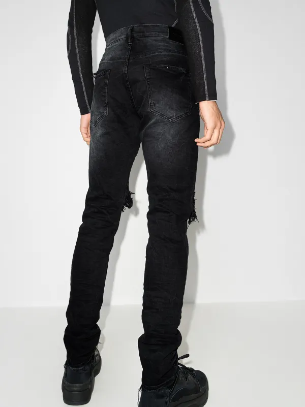 low-rise "Black Wash Blowout" slim jeans