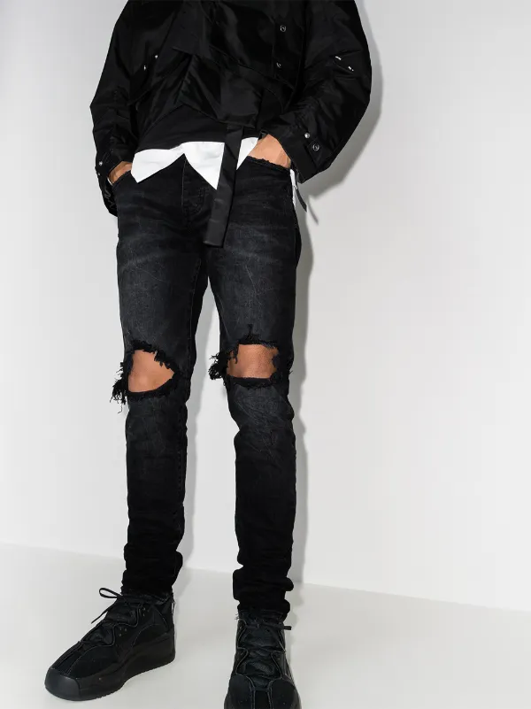 low-rise "Black Wash Blowout" slim jeans