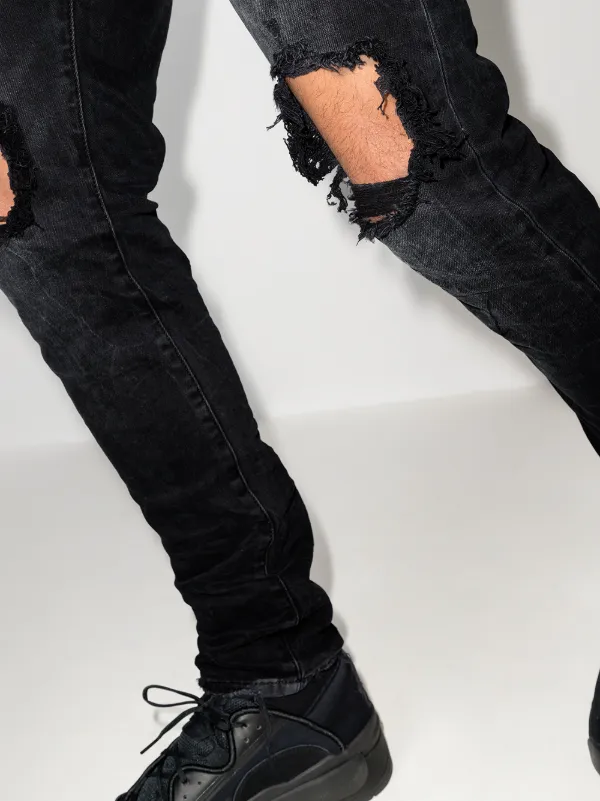 low-rise "Black Wash Blowout" slim jeans