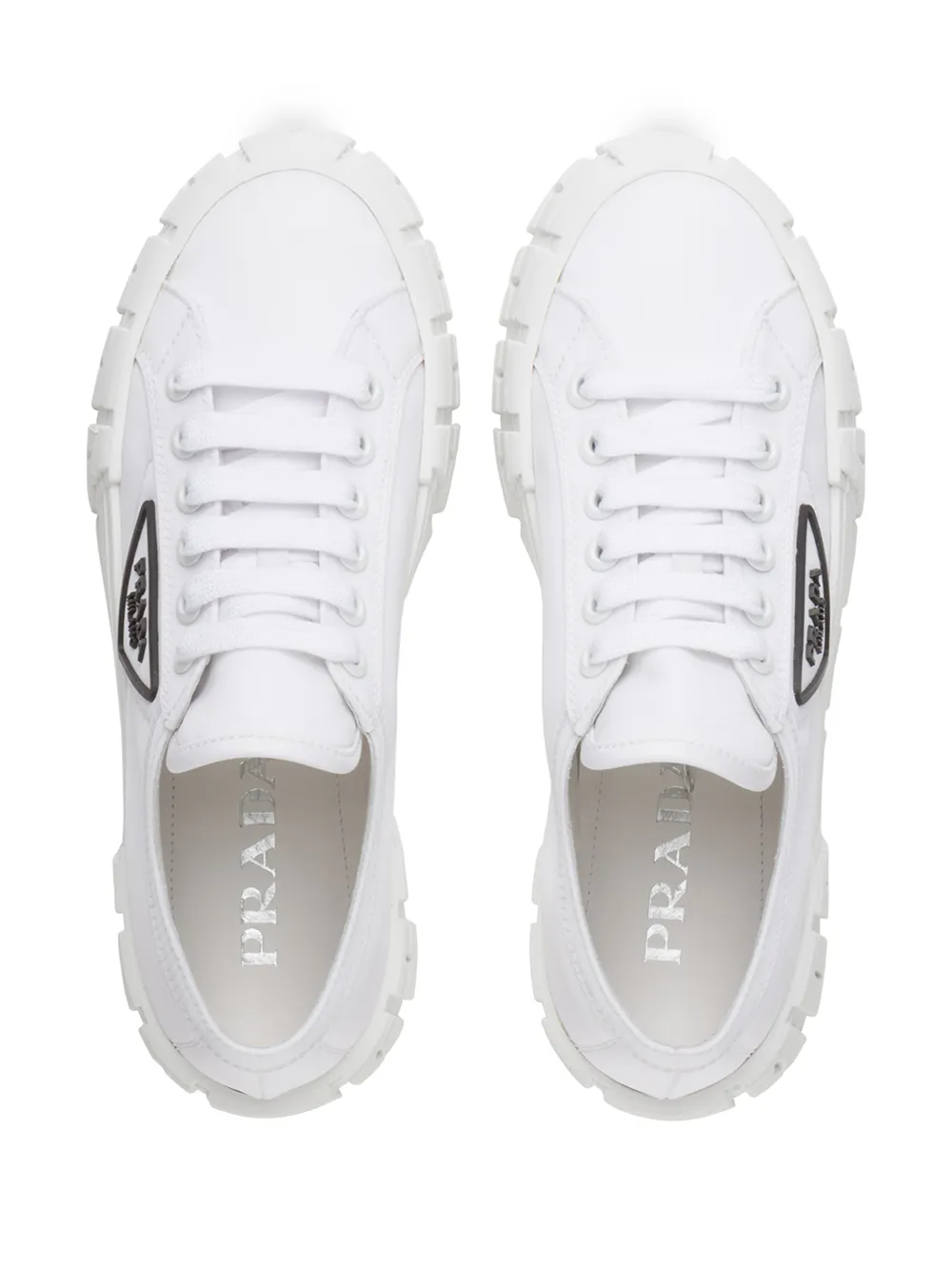 Shop Prada Tyre low-top sneakers with Express Delivery - FARFETCH