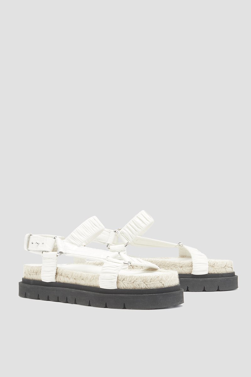 Noa Strappy Platform Slide-white #1 Noa Strappy Platform Slide, Crème brûlée white calf leather Noa strappy flat sandals from 3.1 PHILLIP LIM featuring ruched detailing, strap detailing, open toe, snap-button fastening, round toe, branded insole, braided raffia sole and ridged rubber sole.- 1