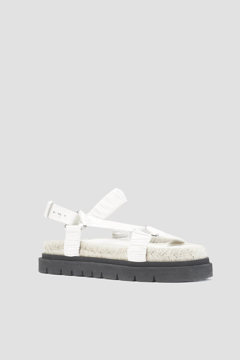 Noa Strappy Platform Slide-white #0 Noa Strappy Platform Slide, Crème brûlée white calf leather Noa strappy flat sandals from 3.1 PHILLIP LIM featuring ruched detailing, strap detailing, open toe, snap-button fastening, round toe, branded insole, braided raffia sole and ridged rubber sole.- 0