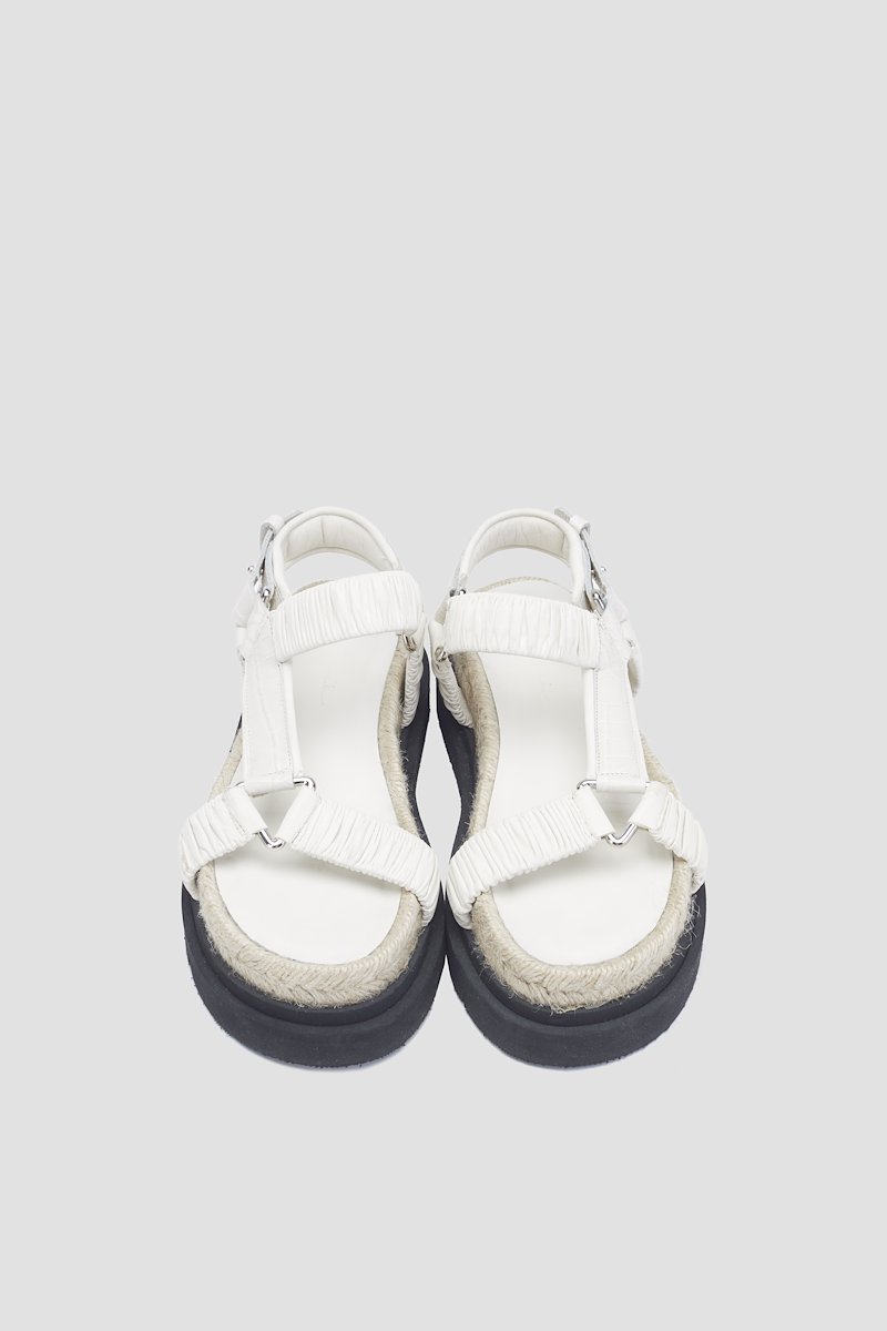 Noa Strappy Platform Slide-white #1 Noa Strappy Platform Slide, Crème brûlée white calf leather Noa strappy flat sandals from 3.1 PHILLIP LIM featuring ruched detailing, strap detailing, open toe, snap-button fastening, round toe, branded insole, braided raffia sole and ridged rubber sole.- 3