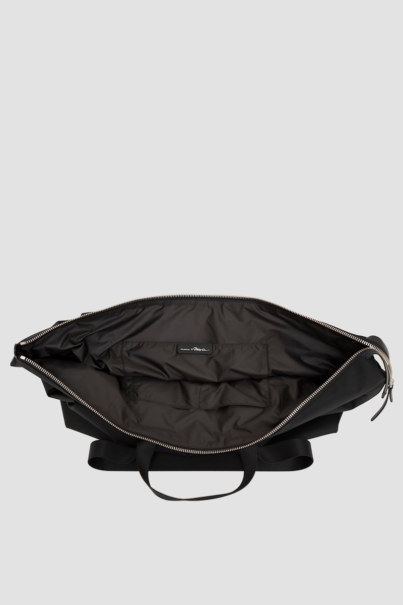The Deconstructed Duffle Bag-black #0 The Deconstructed Duffle Bag, Black Deconstructed duffle bag from 3.1 PHILLIP LIM featuring leather trim, two top handles, two long top handles and top zip fastening.- 2
