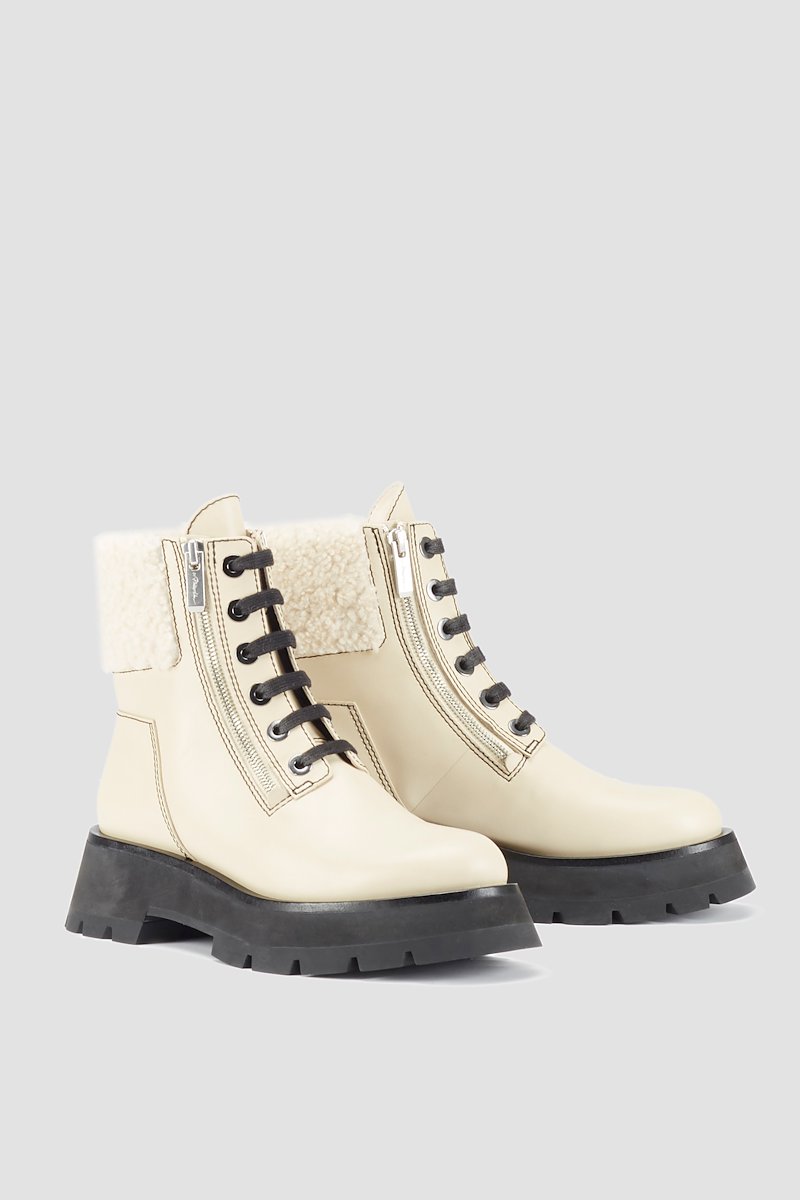 Kate Lug Sole Double Zip Shearling Boot-neutrals #1 Kate Lug Sole Double Zip Shearling Boot, Creme brulee leather shearling-trimmed leather ankle boots from 3.1 PHILLIP LIM featuring shearling trim, front lace-up fastening, ridged rubber sole, almond toe and short side zip fastening.- 1