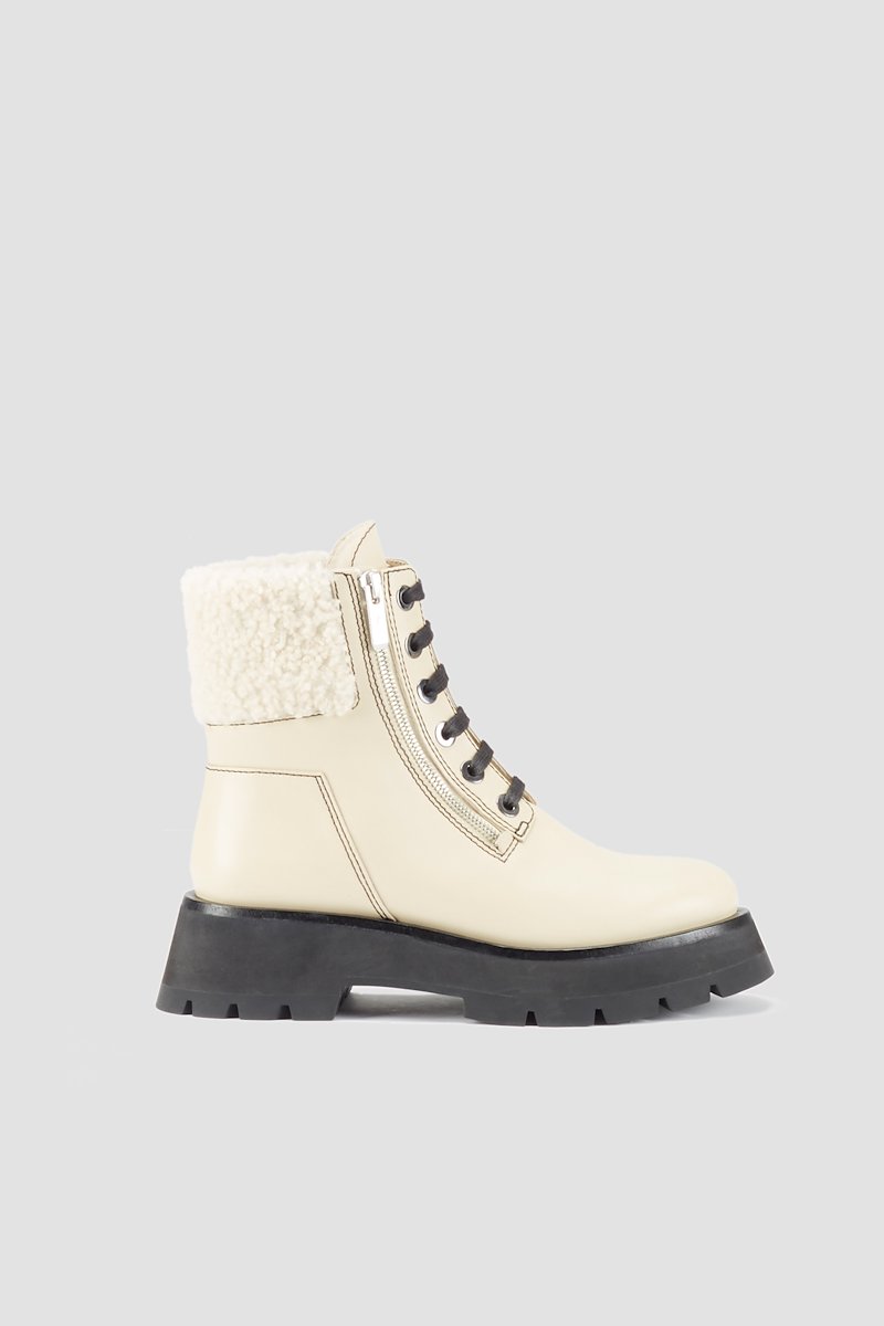 Kate Lug Sole Double Zip Shearling Boot-neutrals #0 Kate Lug Sole Double Zip Shearling Boot, Creme brulee leather shearling-trimmed leather ankle boots from 3.1 PHILLIP LIM featuring shearling trim, front lace-up fastening, ridged rubber sole, almond toe and short side zip fastening.- 0