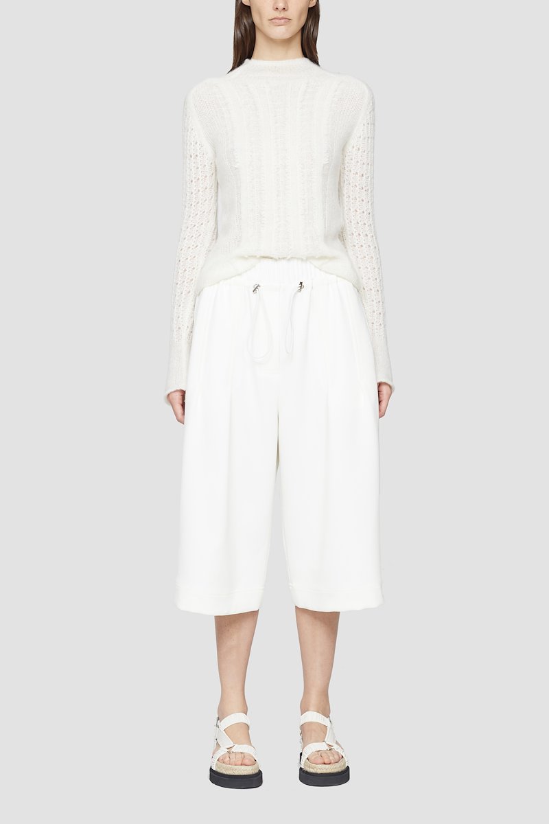 Twill Culotte-white #1 Twill Culotte, White high-rise cropped trousers from 3.1 PHILLIP LIM featuring box-pleat detail, high waist, elasticated waistband, drawstring waist, two side slit pockets, two rear flap pockets, wide leg and cropped leg.- 3