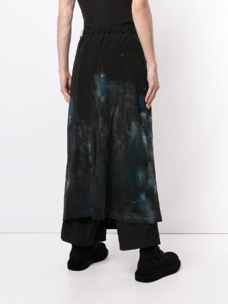 skirt-overlaid asymmetric trousers展示图