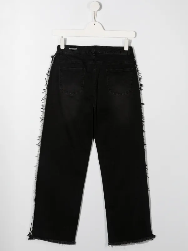 jeans with frayed sides