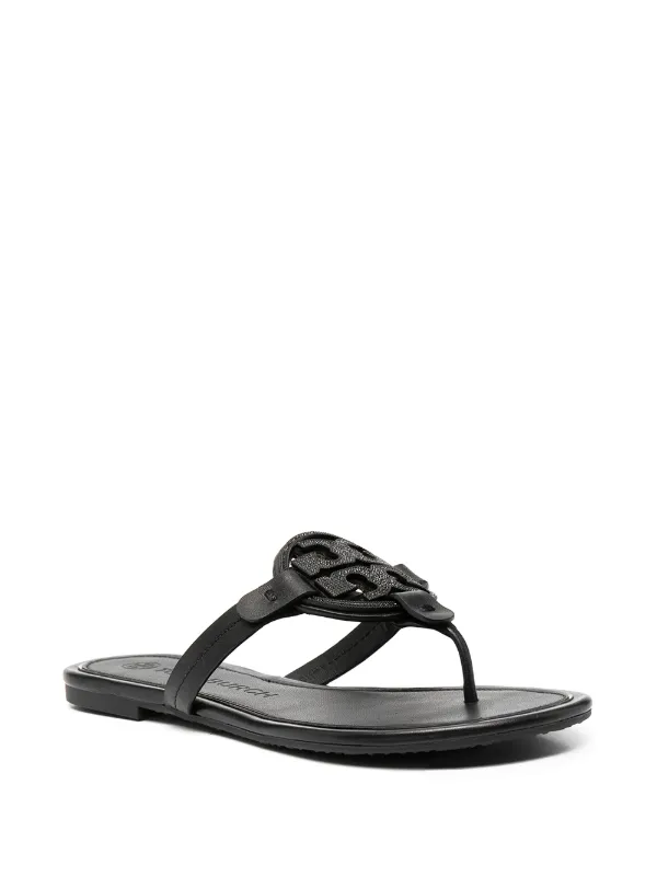 black gray and white ugg slides
