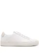 Image 1 of Common Projects panel detailing lace-up sneakers