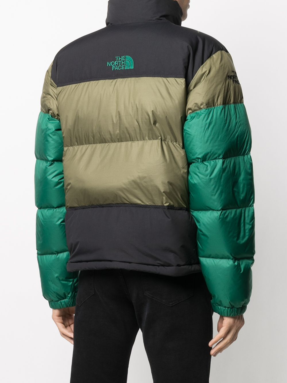 фото The north face пуховик в стиле колор-блок с капюшоном