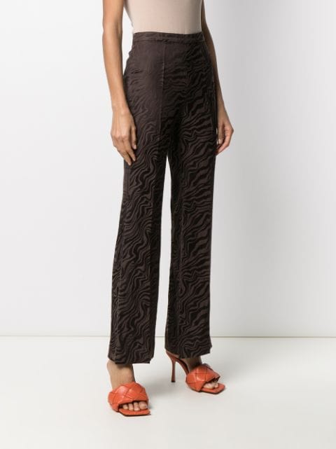 SANDRO abstract-print Flare Trousers - Farfetch