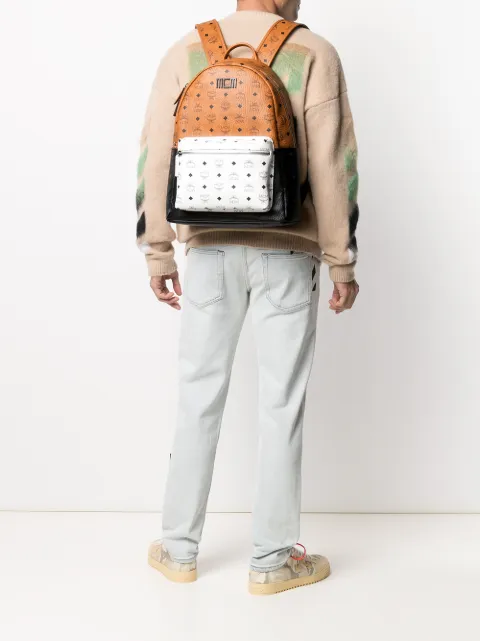 mcm backpack on person