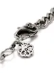 Alexander McQueen pulsera con detalle de calavera