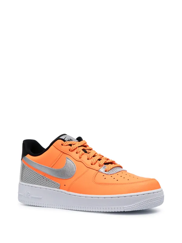 orange low top nikes