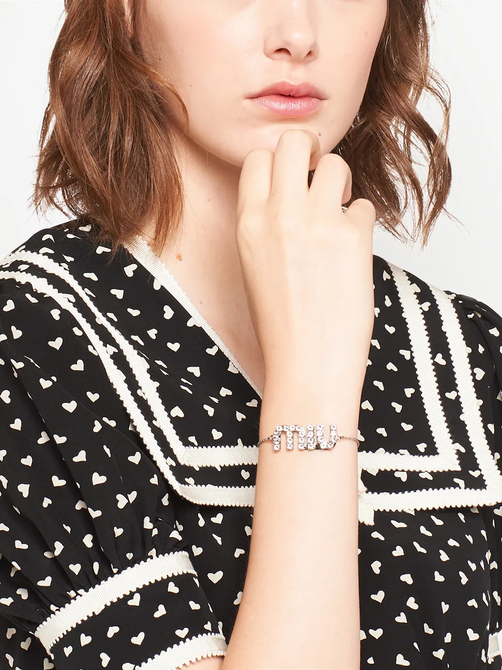 Shop Miu Miu Crystal-embellished Logo Bracelet In Silver